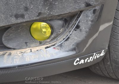 Юбка переднего бампера карбоновой пленкой — Corolla