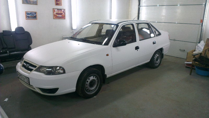 Фотография работы: Chevrolet Cruze, Lacetti, Aveo и Daewoo Nexia - оклейка автомобилей для такси в белый цвет - сентябрь 2013