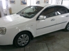 Фотография работы: Chevrolet Cruze, Lacetti, Aveo и Daewoo Nexia - оклейка автомобилей для такси в белый цвет - сентябрь 2013