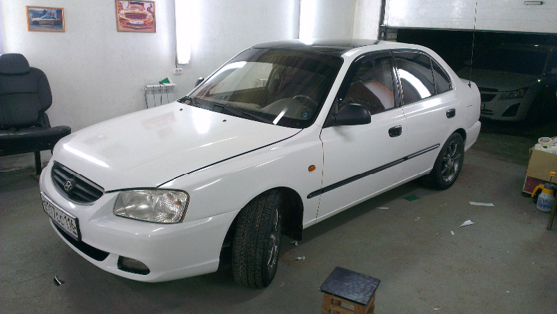 Фотография работы: Chevrolet Lacetti, Hyundai Accent - оклейка авто для такси, сентябрь 2013