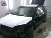 Фотография работы: Оклейка автомобиля Ford Focus белой пленкой для такси - май 2013
