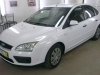 Фотография работы: Оклейка автомобиля Ford Focus белой пленкой для такси - май 2013