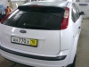 Фотография работы: Оклейка автомобиля Ford Focus белой пленкой для такси - май 2013