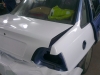 Фотография работы: Оклейка автомобиля Daewoo Nexia белой пленкой для такси - май 2013