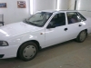 Фотография работы: Оклейка автомобиля Daewoo Nexia белой пленкой для такси - май 2013